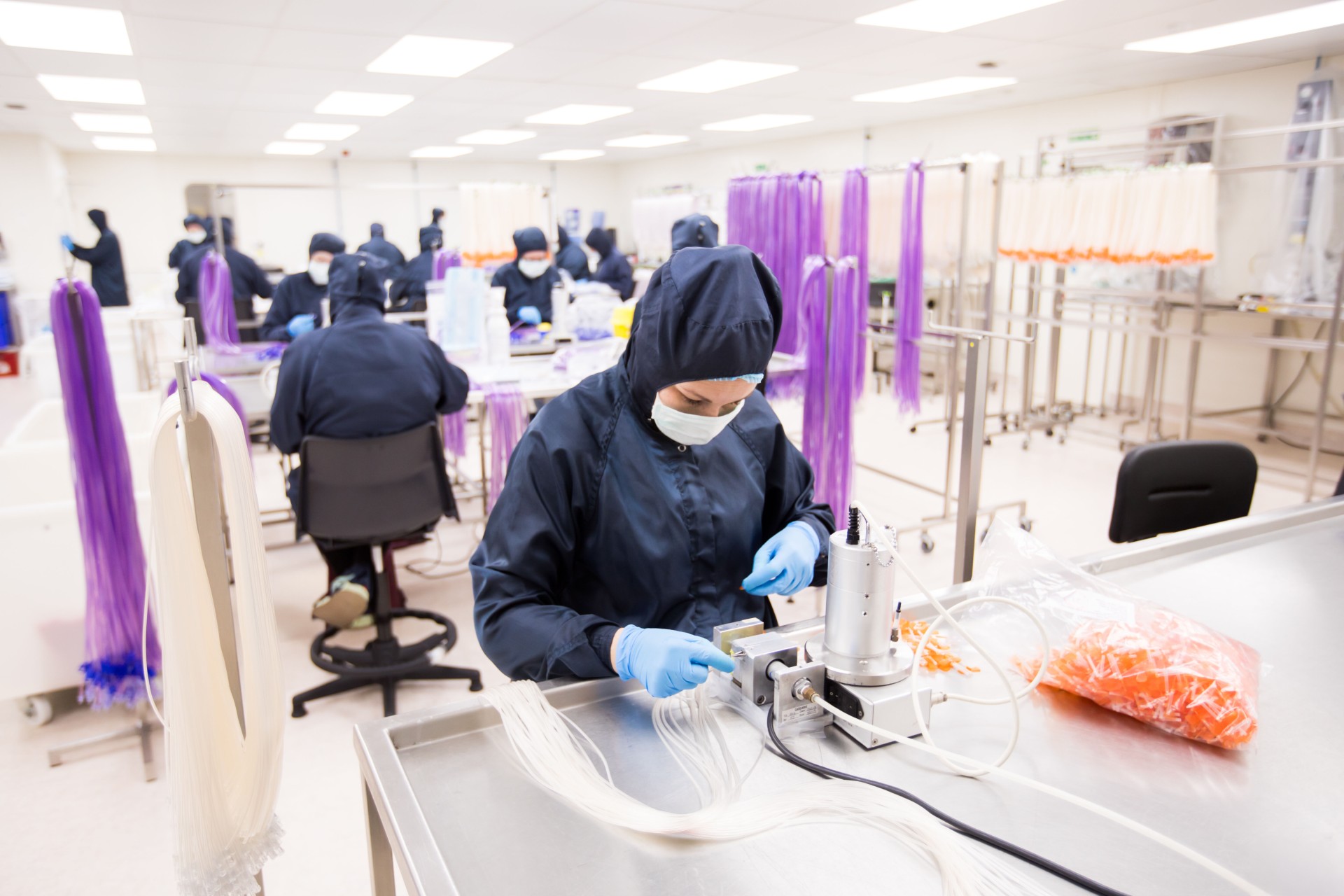 Image of Meridian Medical technicians sat at rows of desk working